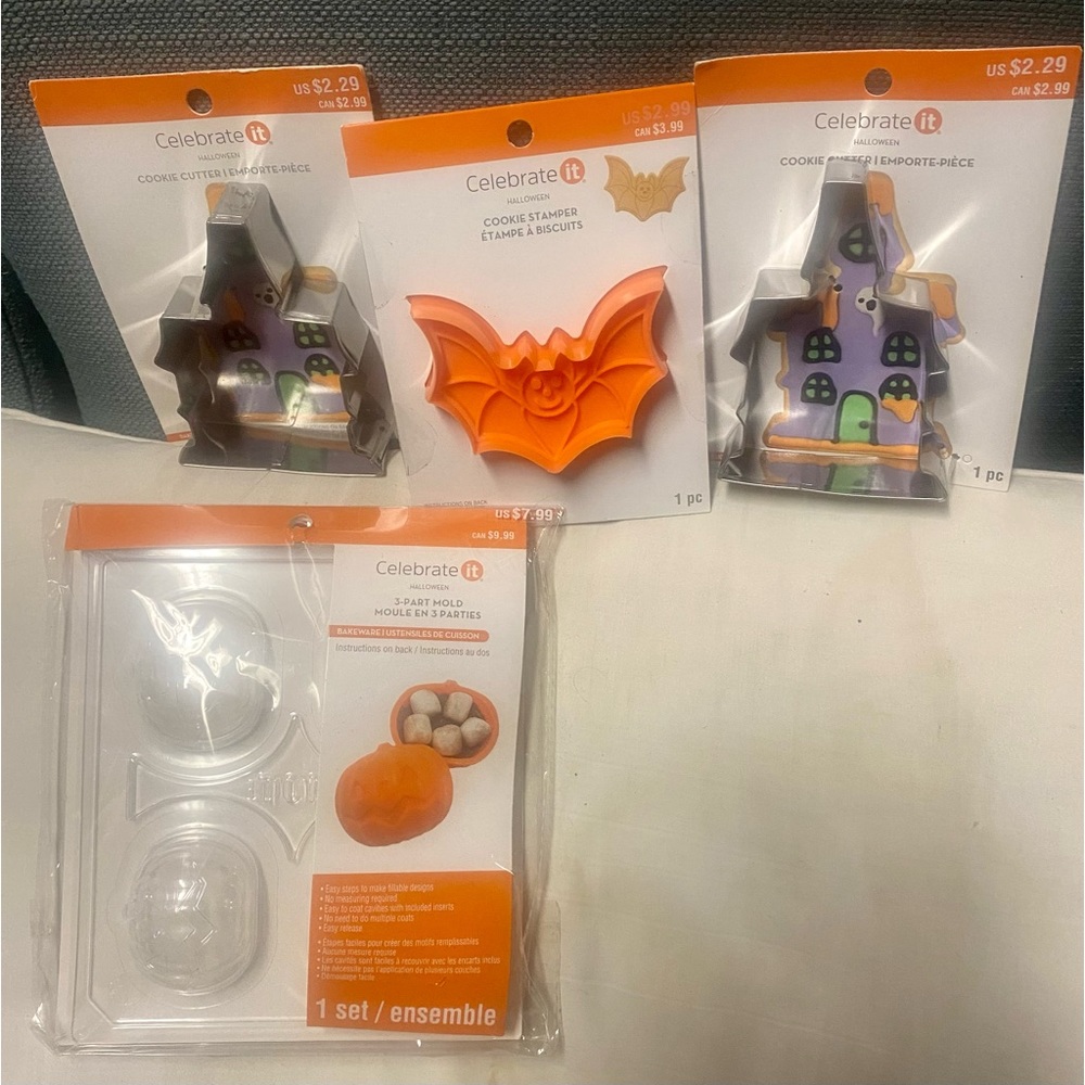 NWT…2 haunted house cookie cutters and one bat cookie stamper and one pumpkin m